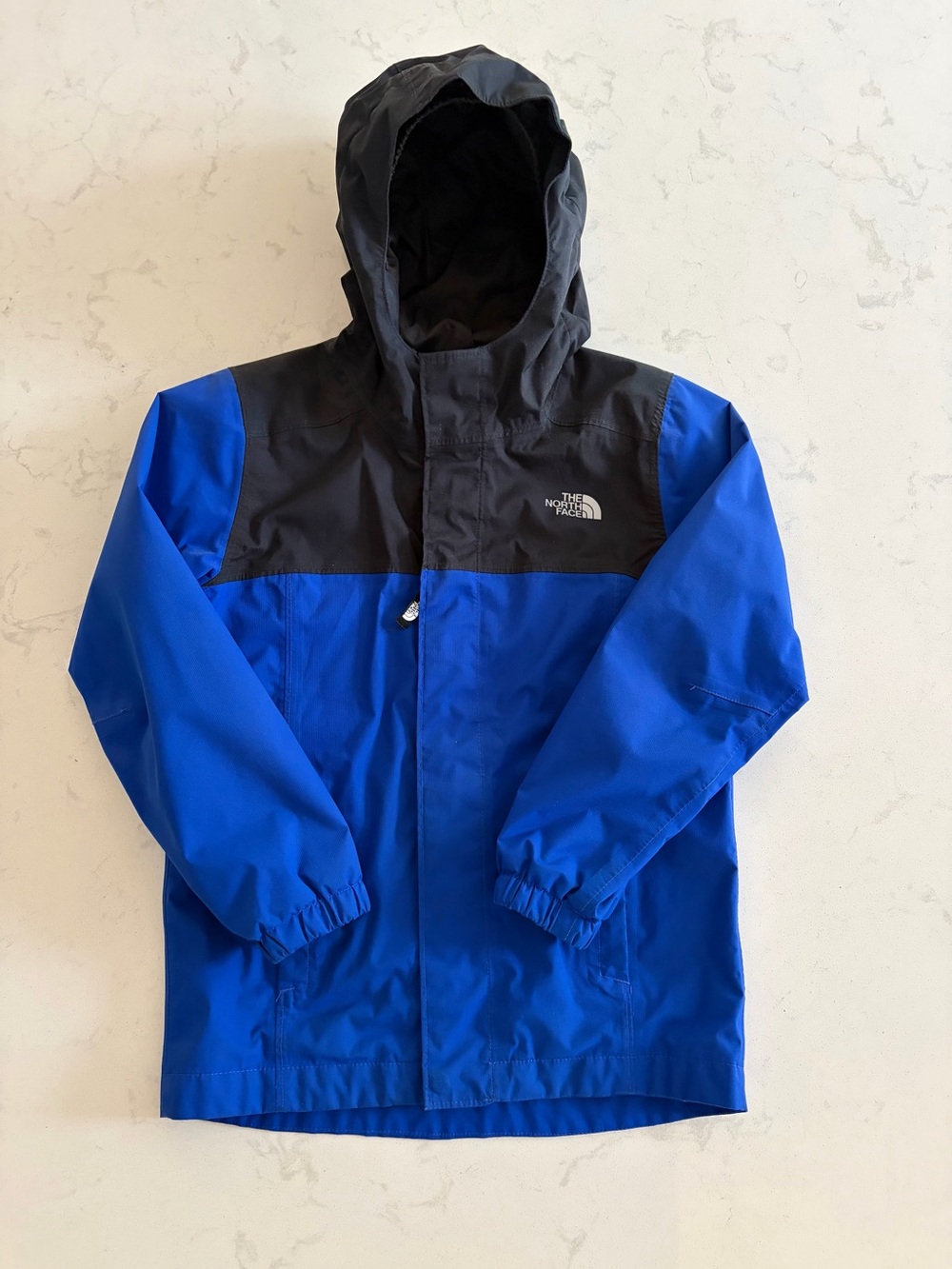 The North Face Blue and Black Kids Rain Jacket